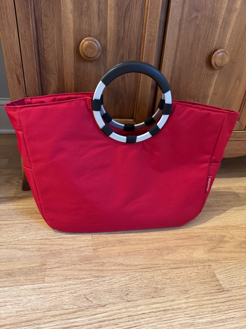 Reisenthel bag. The coolest bag! Holds a ton, yet the easiest to carry!